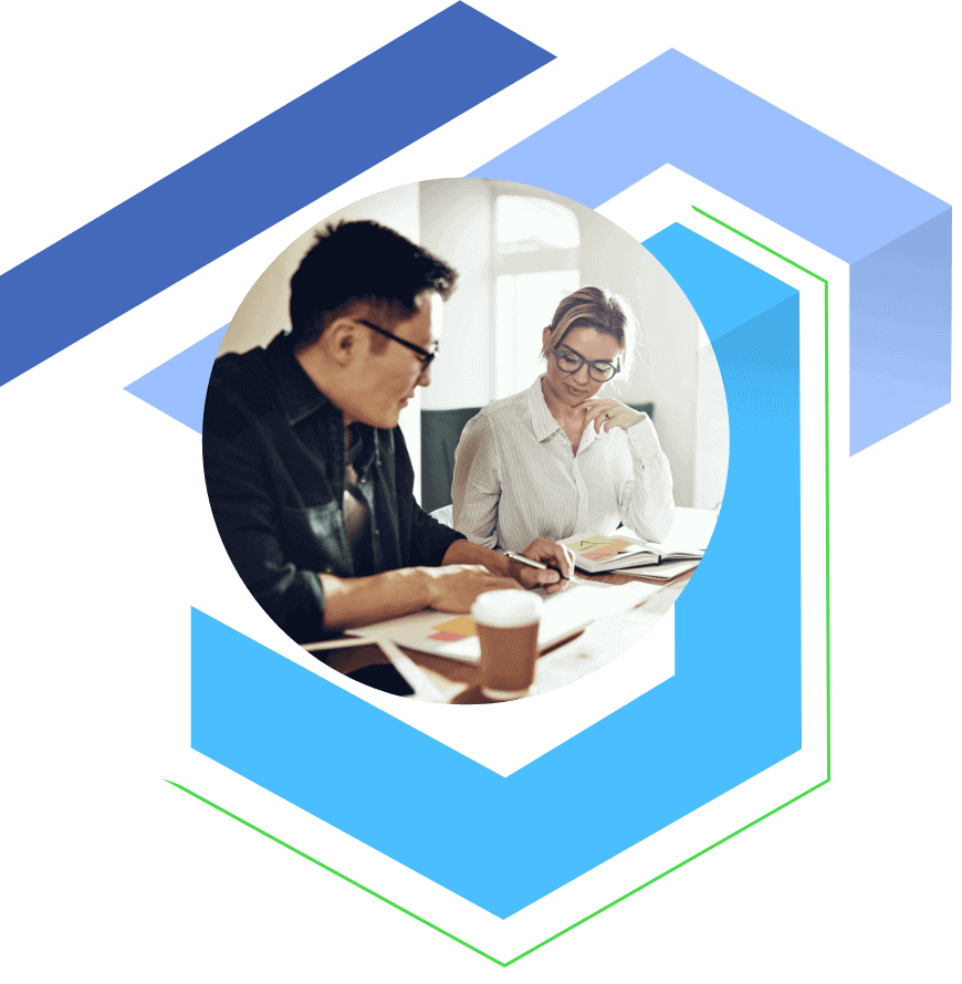 coworkers working at a table - working at Theriva